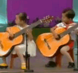 Estos niños chinos son de otro mundo, increíble como tocan la guitarra! [Vídeo]